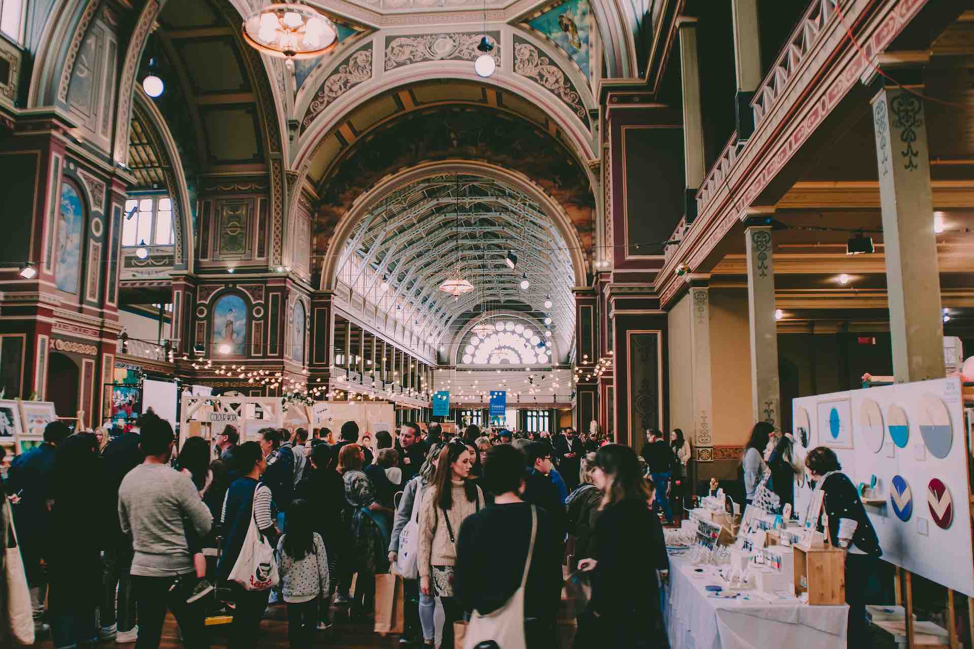 britt-gaiser-hSAlu33padA-unsplash 4 People at conference in large hall